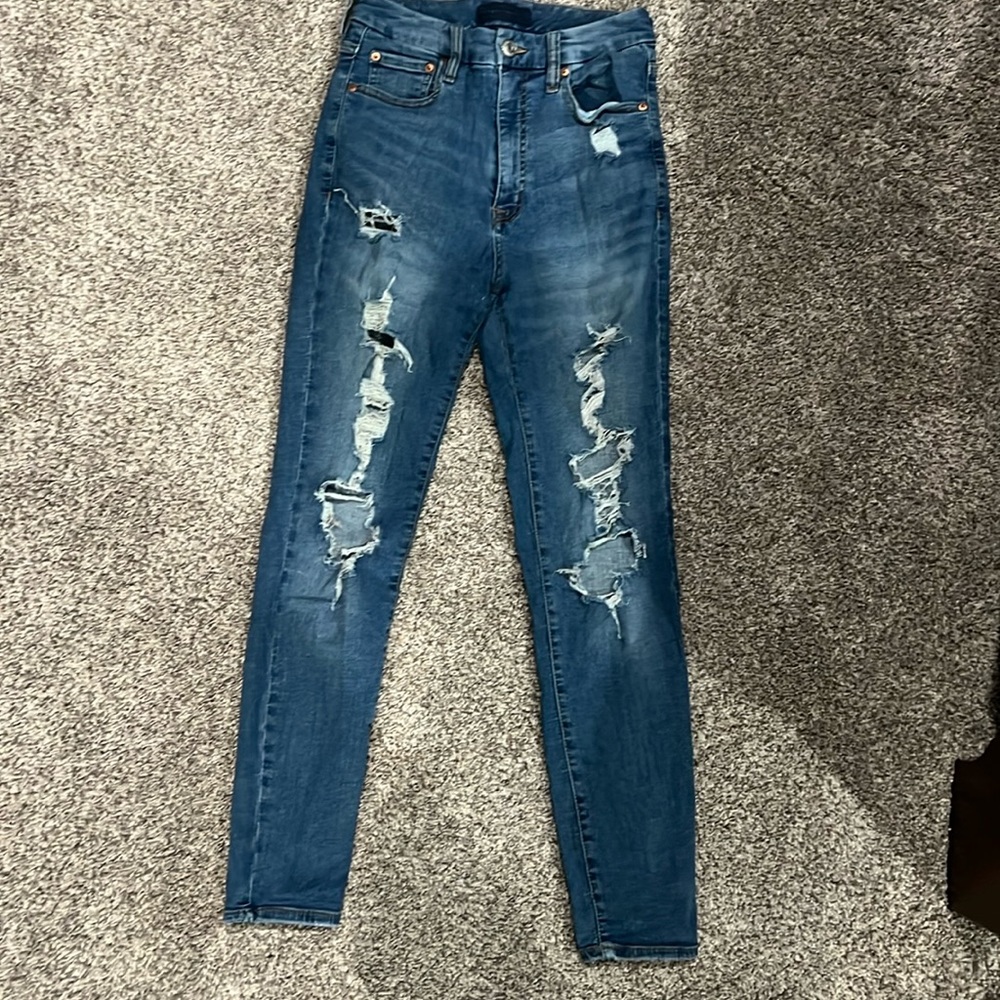 Distressed jeans like new